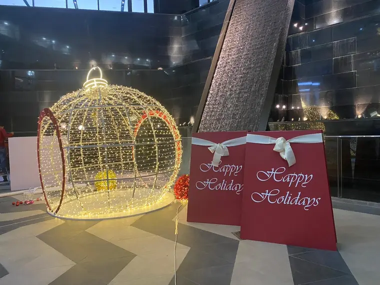 Illuminated holiday bauble installation